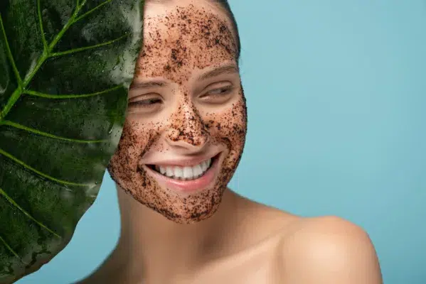 Smiling Young Woman With Coffee Scrub On Face Iso 2024 11 10 19 17 45 Utc 1